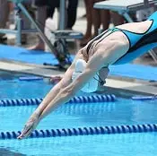 Image of a swimmer diving into the water