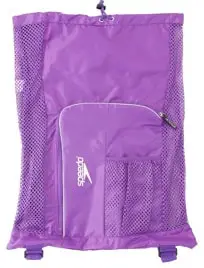 Image of a purple mesh gear bag from Speedo. This mesh gear bag has a large pocket on the front